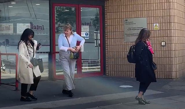<p>Katie Wallis, centre, leaving Cardiff Magistrates’ Court earlier this year</p>