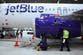 JetBlue is cutting flights and reducing staff hours because people aren’t traveling as much