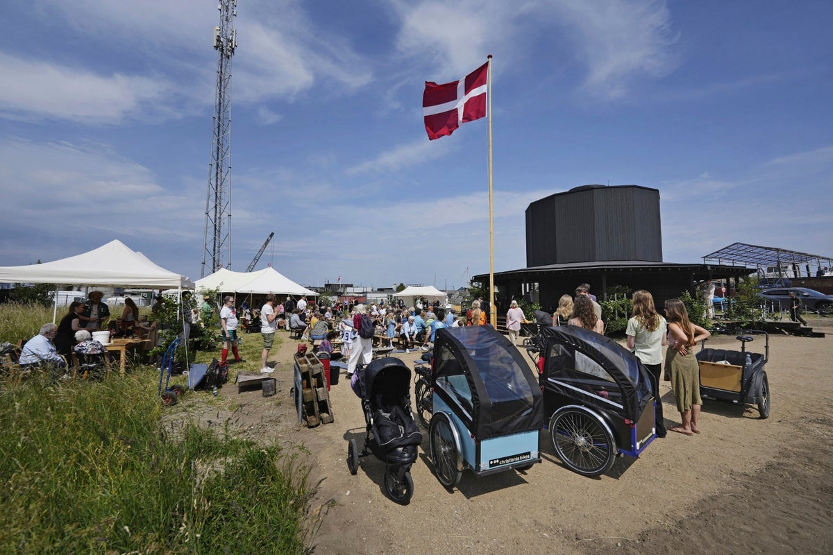 A tiny church in Denmark celebrates community and coziness within 12 walls — one for each apostle