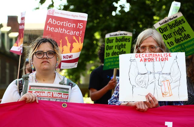 <p>Protesters from pro-choice group Abortion Rights outside parliament, where MPs were given a free vote on the decriminalisation of abortion</p>