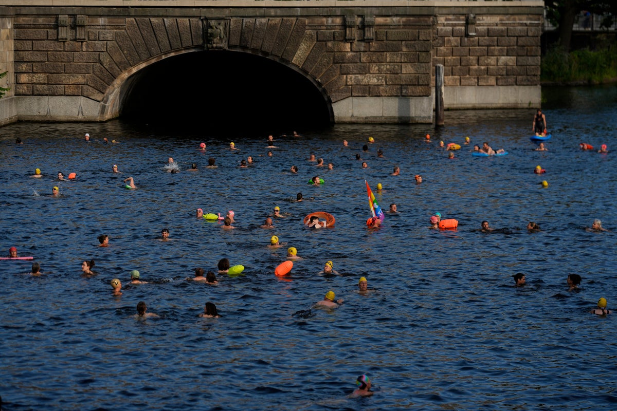 https://static.independent.co.uk/2025/06/17/19/Germany_Berlin_River_Swimmers_38374.jpg?width=1200&height=800&crop=1200:800