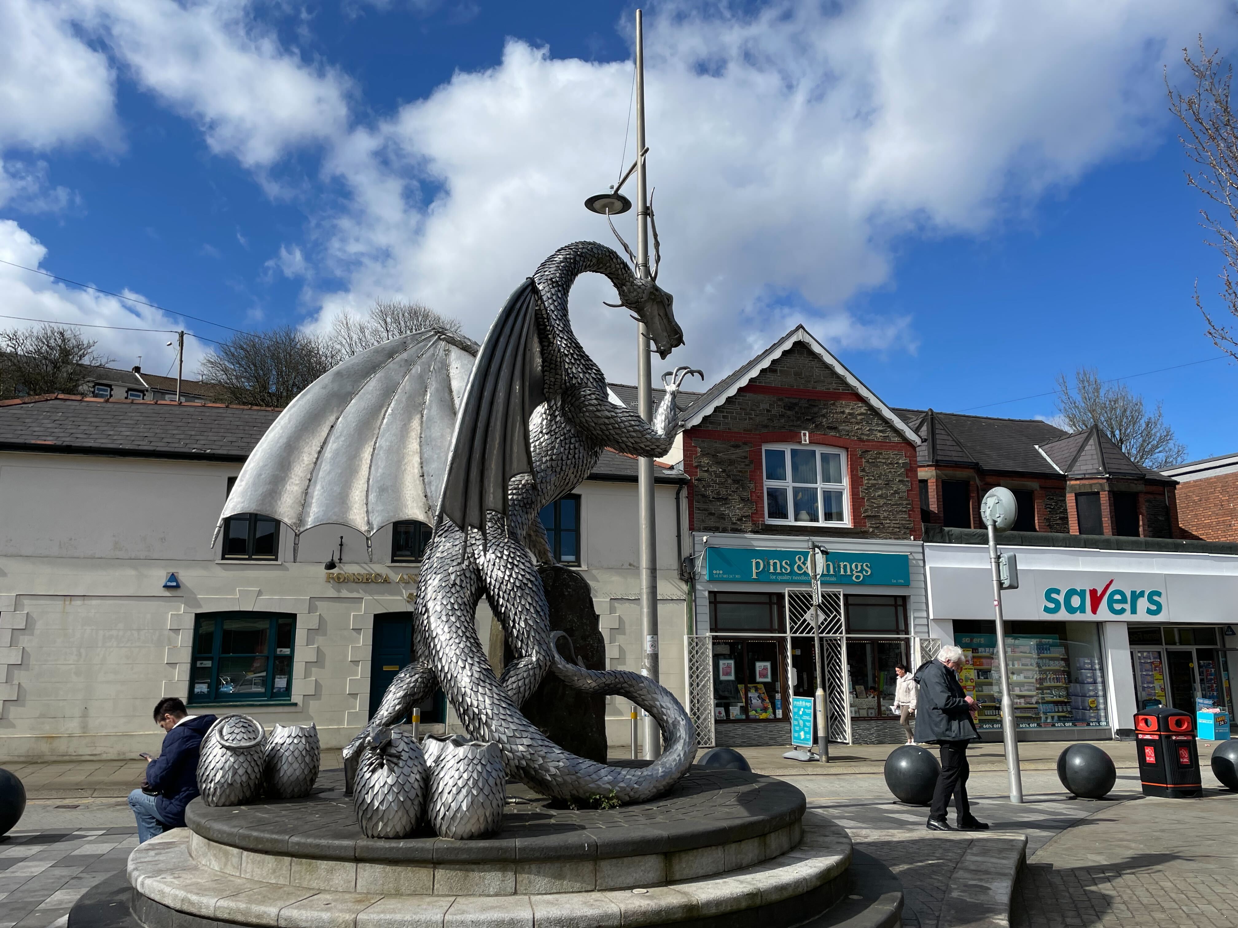 The steel dragon, paid for by EU funds, was supposed to remind people of the glory of the town's former steelworks, but it's location, flanked by Savers, hardly reflects such times