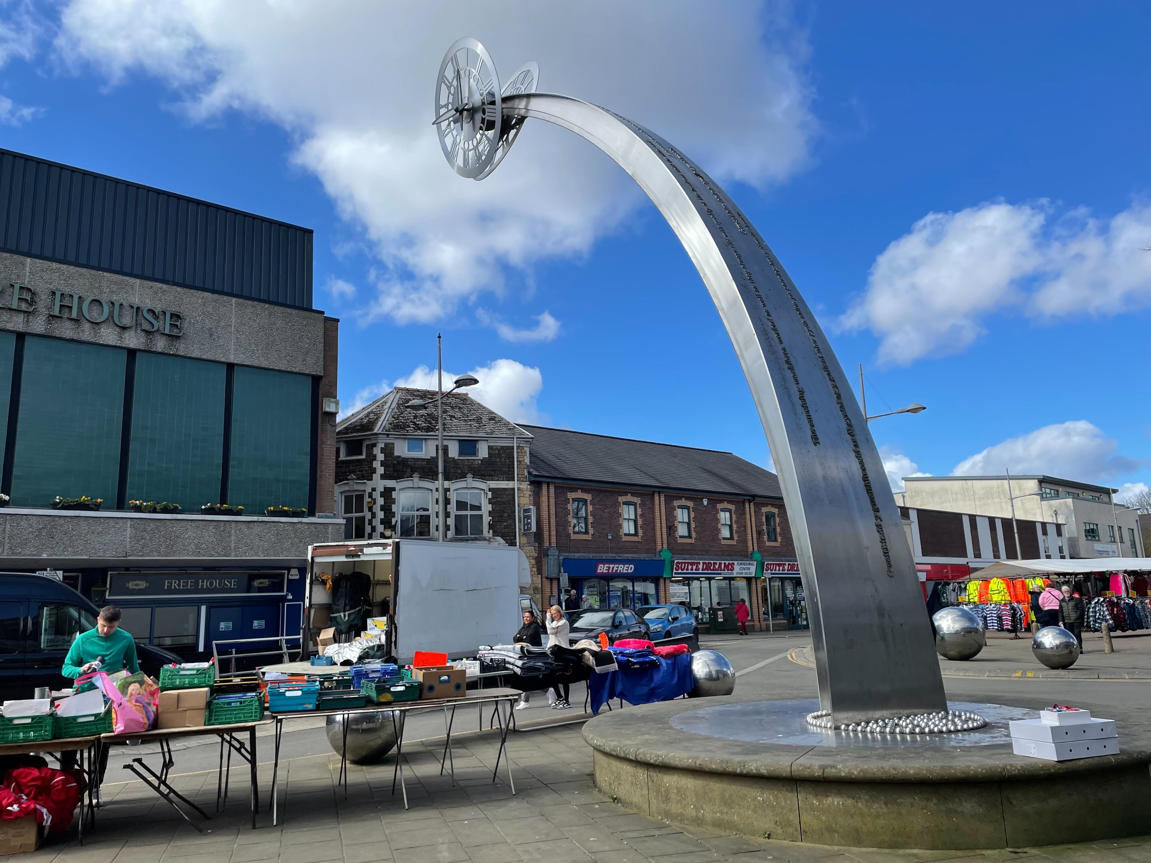 The infamous town clock, built in 2012, which some describe as a 'pizza cutter'