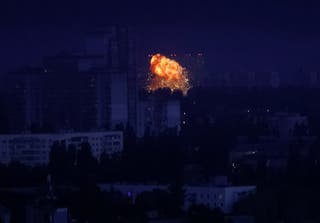 An explosion of a missile is seen during a Russian missile strike in Kyiv