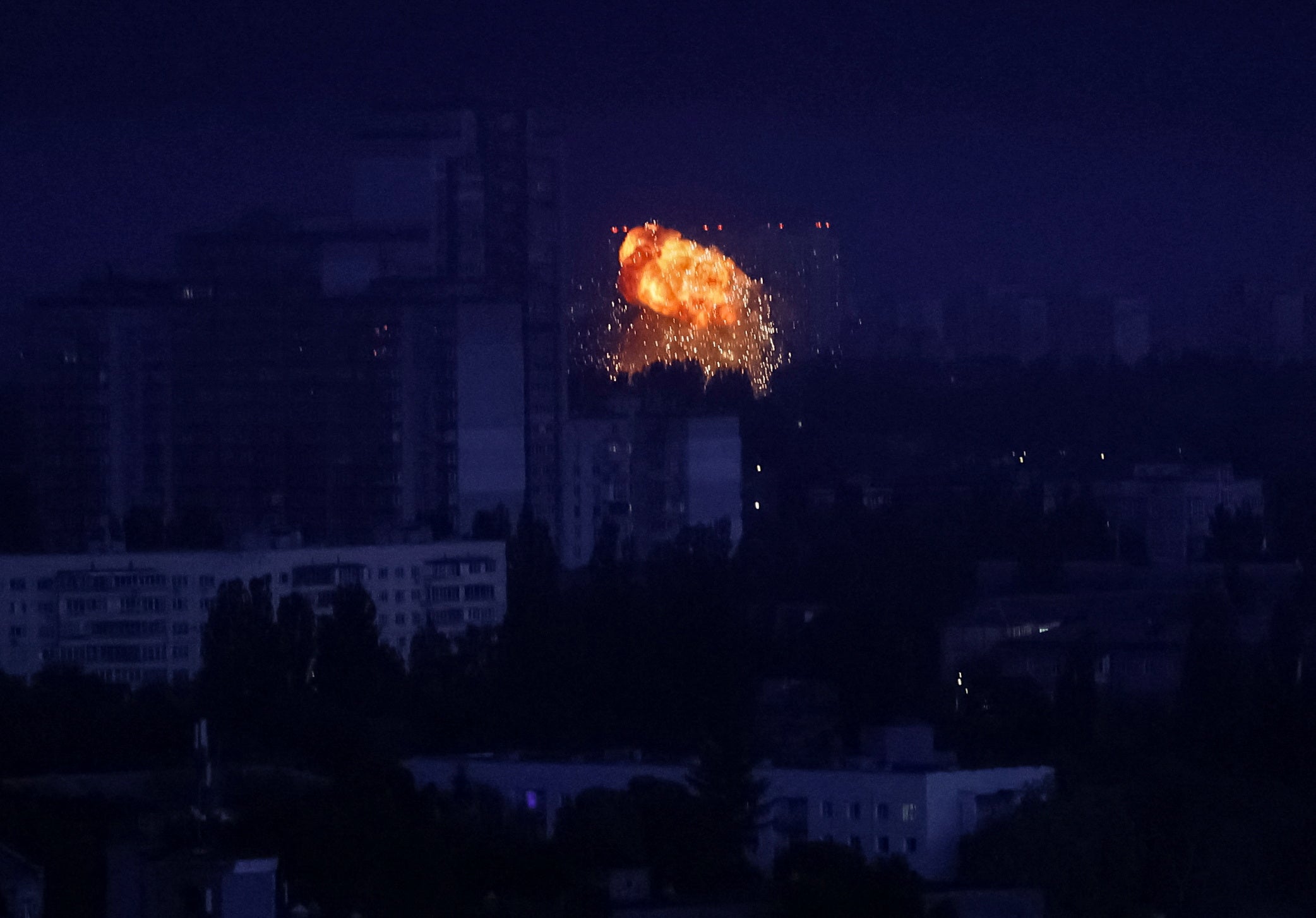 A missile seen exploding during a Russian attack on Kyiv overnight