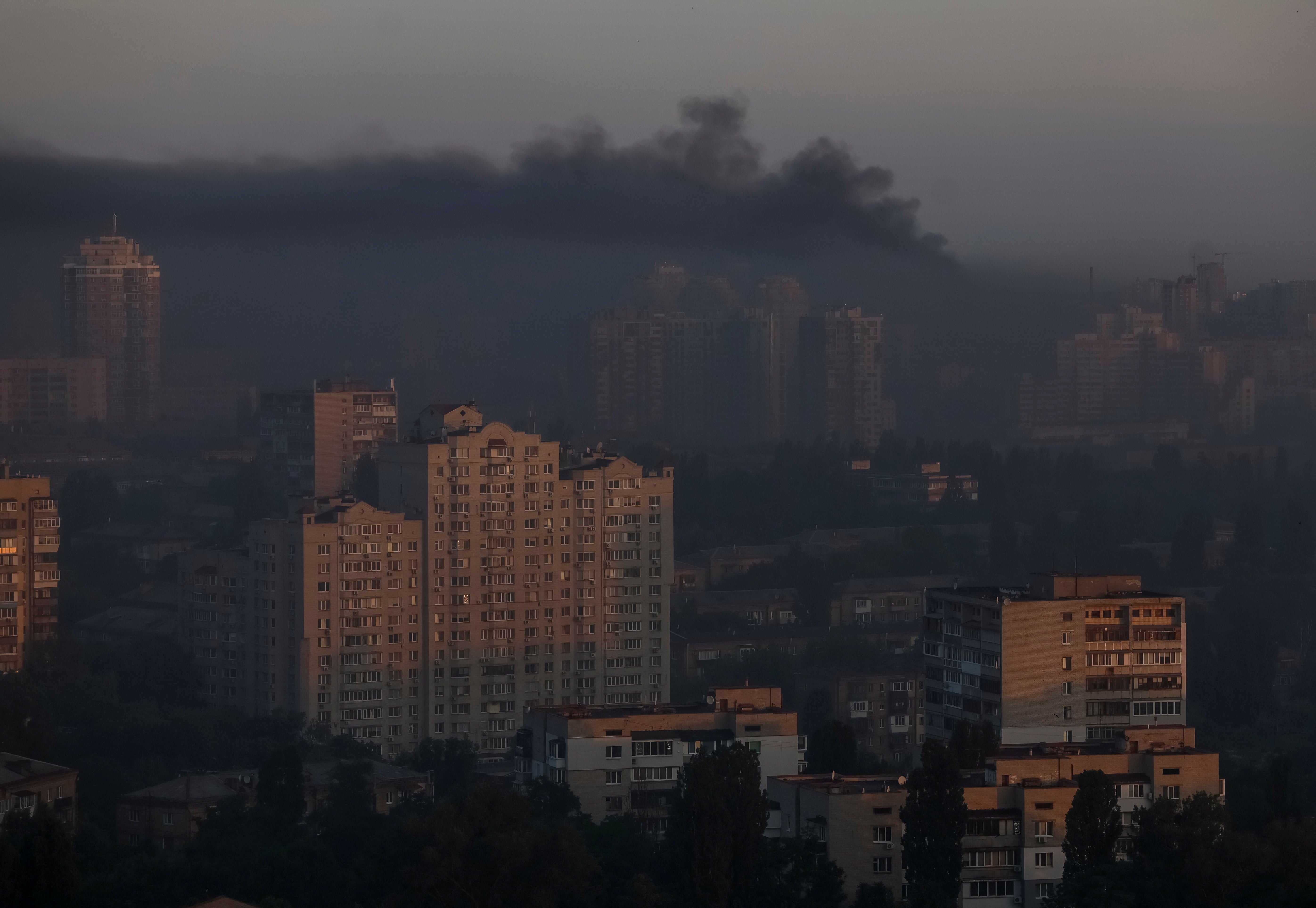 Smoke rises in the city after a Russian missile and drone strike in Kyiv