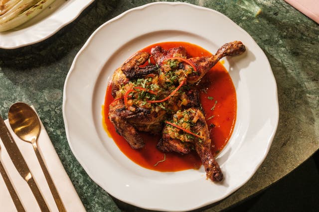 <p>Charred spatchcock poussin with pickled chilli and fresh salsa – perfect for the barbecue</p>