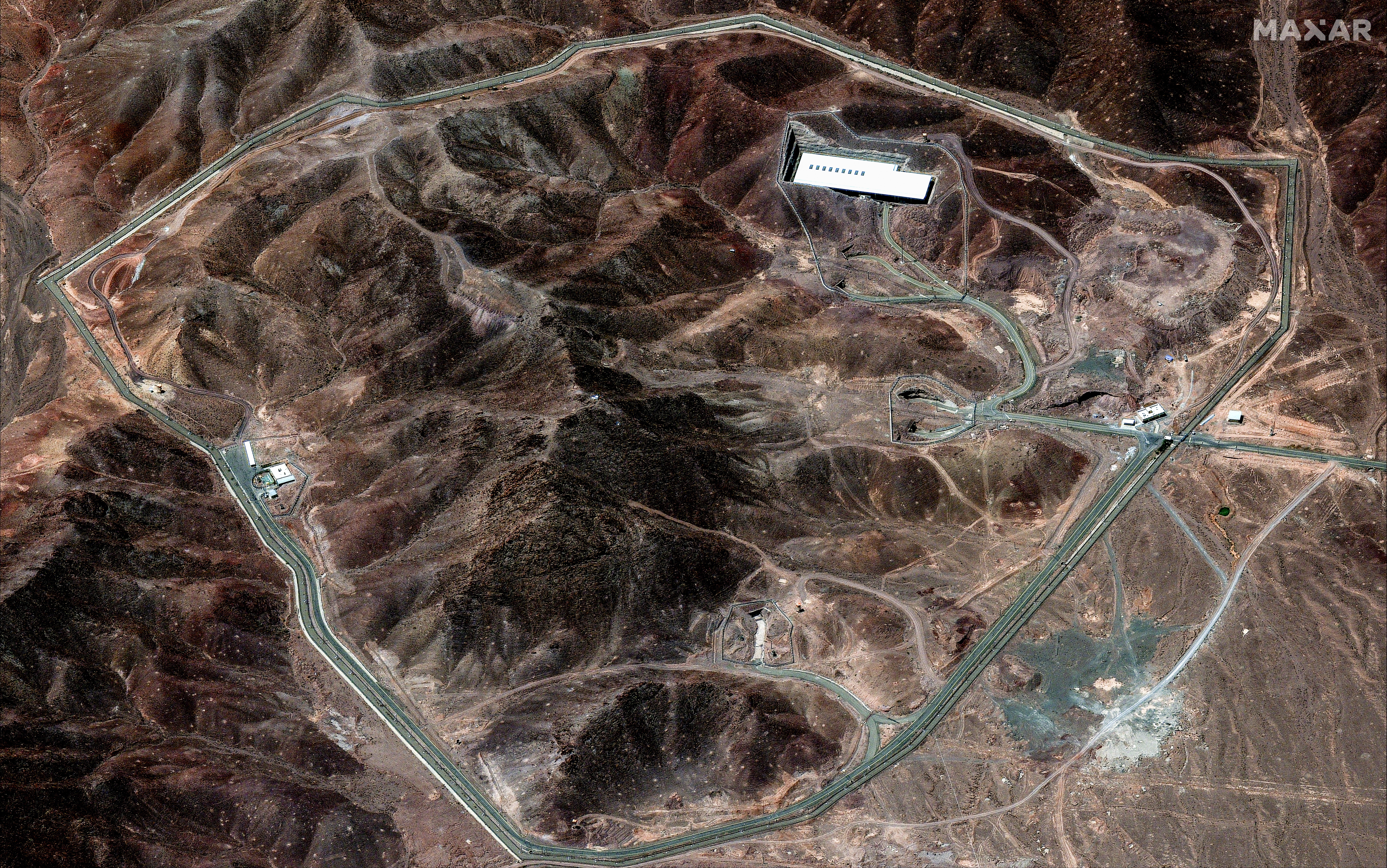 A handout satellite image made available by Maxar Technologies shows the Fordow nuclear facility