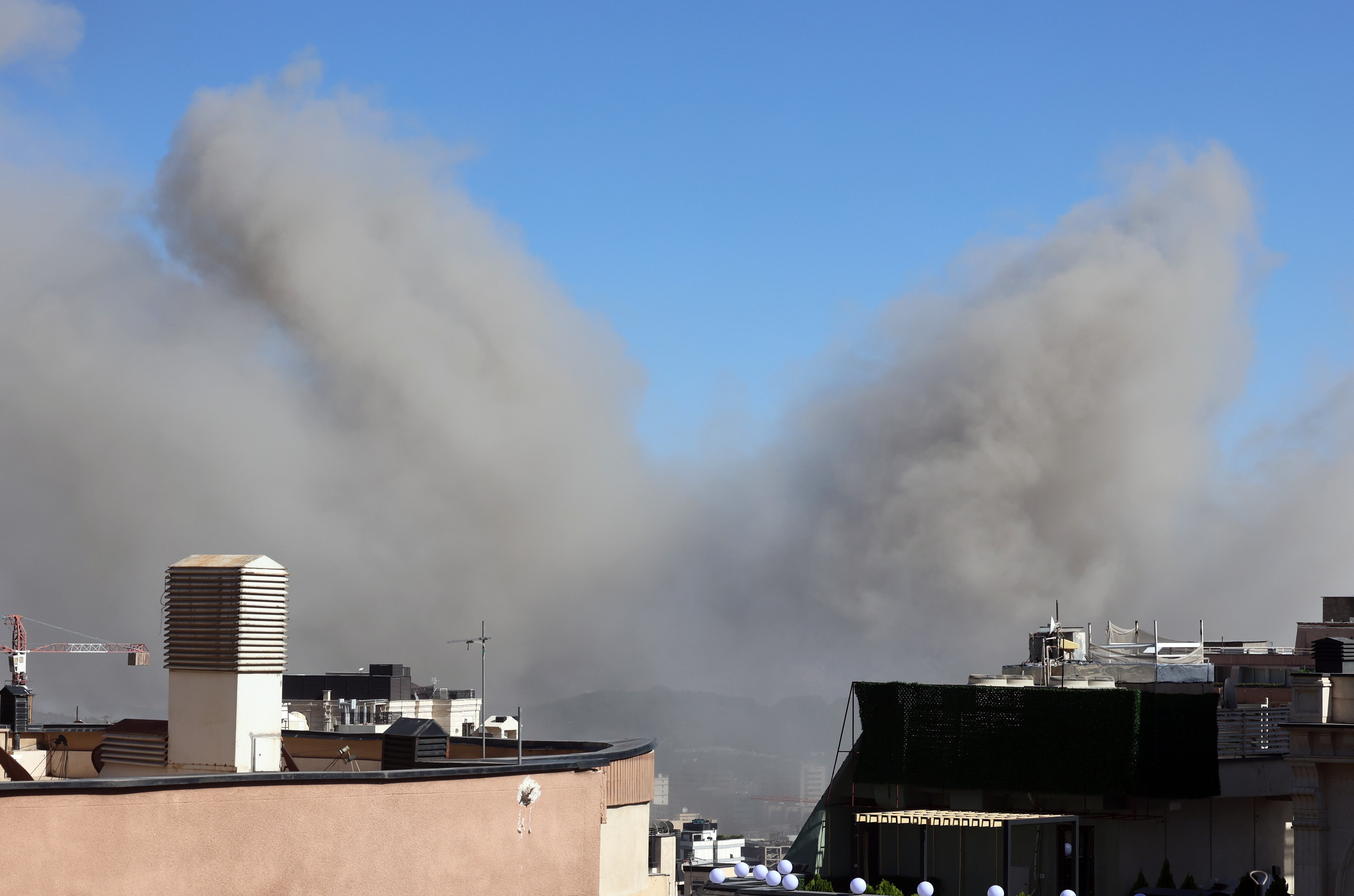 Smoke rises following an Israeli airstrike on Tehran, Iran