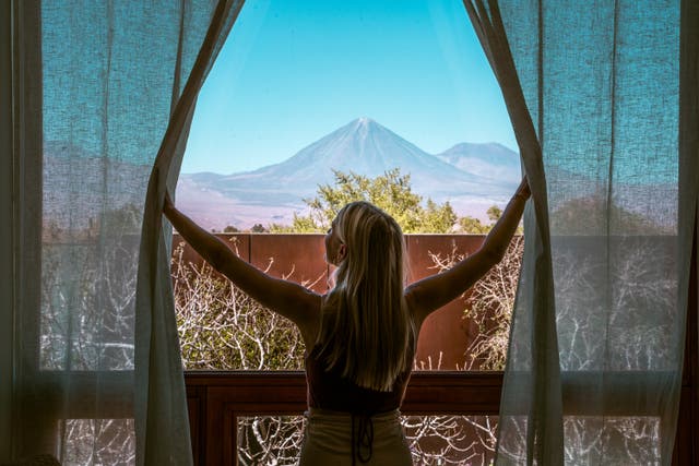 <p>The Licancabur volcano seen through a room at Tierra Atacama hotel.</p>