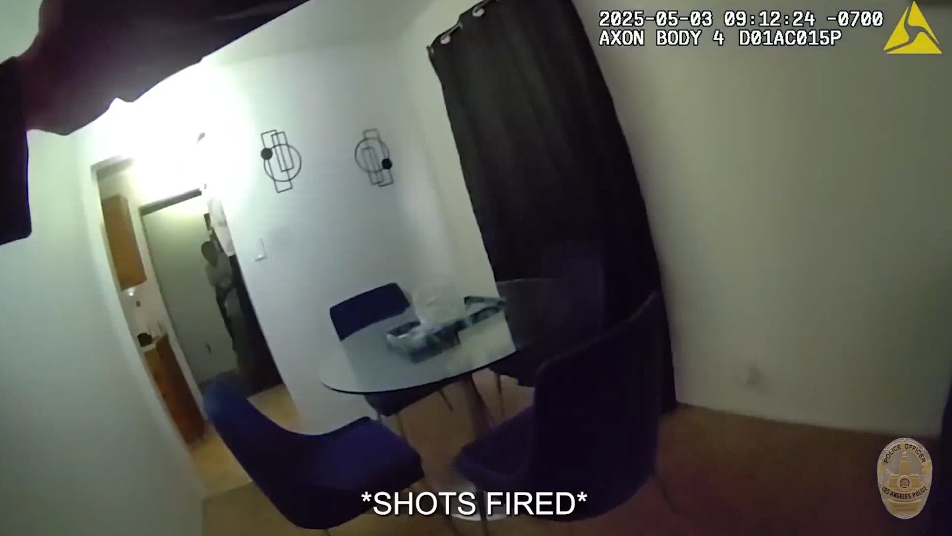 <p>Suspect compliments officer after he is gunned down</p>