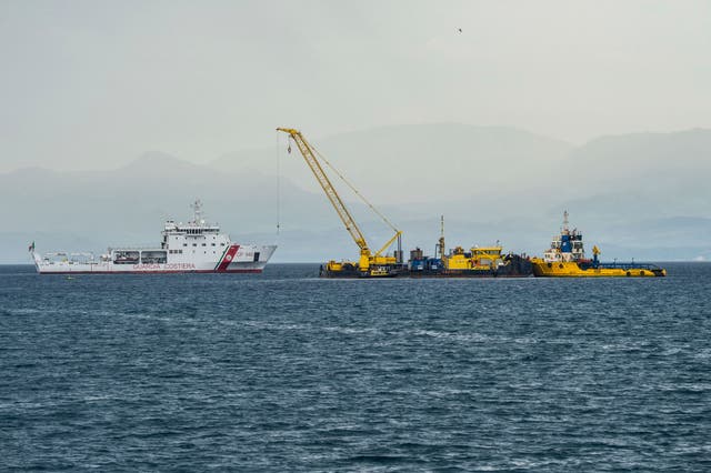 <p>Italian Coast Guard's Luigi Dattilo patrol boat, left, assists the multi-purpose floating work barge Hebo Lift 2 monitoring the stretch of sea off Porticello, near Palermo, Sicily, Italy, Sunday, May 4, 2025, where the British superyacht Bayesian sunk on August 19, 2024 as the operations for its recovery start. (AP Photo/Salvatore Cavalli, File)</p>