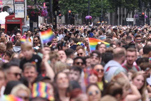<p>People take part in the Pride in London parade in Trafalgar Square (James Manning/PA)</p>