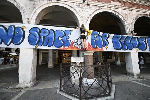 <p>People gather to protest against the wedding of Amazon Founder and CEO Jeff Bezos and journalist Lauren Sanchez in Venice, on June 13, 2025</p>