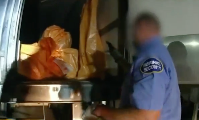 <p>Police body camera video shows officials investigating a burglarized Brinks semitruck. Prosecutors say seven men stole $100m worth of jewelry from the truck in 2022</p>