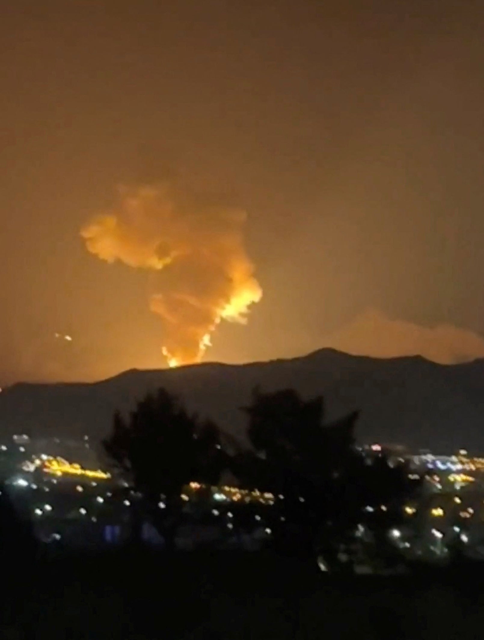 Smoke billows over Tehran during the strikes in June