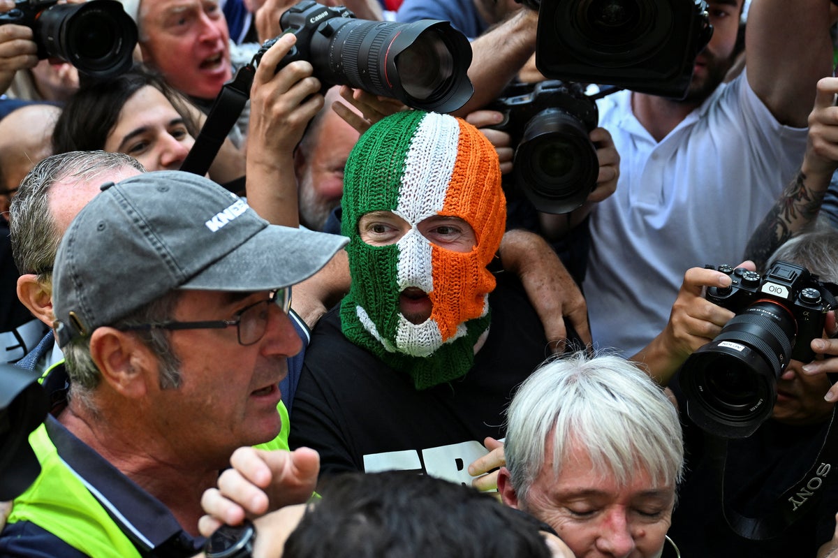 Huge crowds of Kneecap supporters rally outside court as Mo Chara appears on terrorism charge