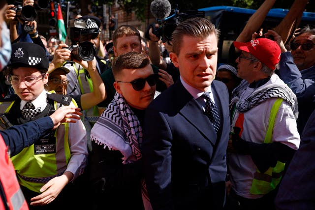 <p>Kneecap’s Liam Og O hAnnaidh arrived at Westminster Magistrates Court, where crowds of supporters had gathered</p>