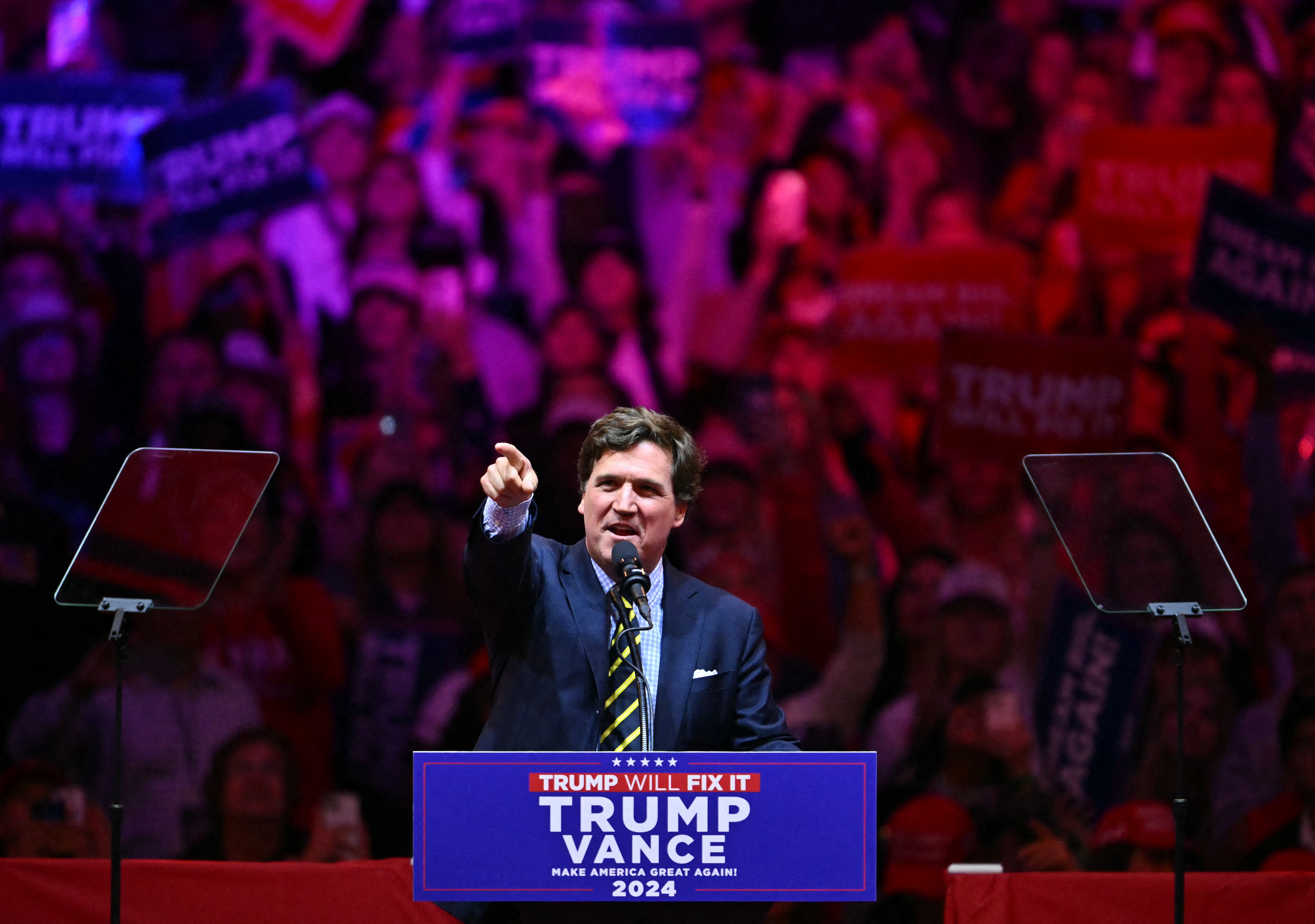 Talk show host Tucker Carlson speaks during a campaign rally for former US President and Republican presidential candidate Donald Trump at Madison Square Garden in New York on October 27, 2024.