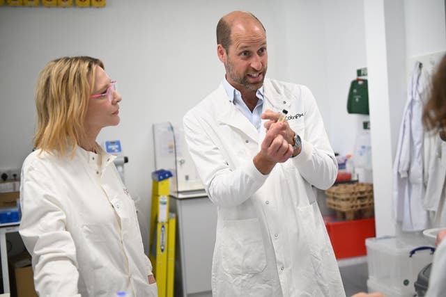 The Prince of Wales and Cate Blanchett were shown round labs at Colorifix, an eco-friendly textile dye company (/PA)