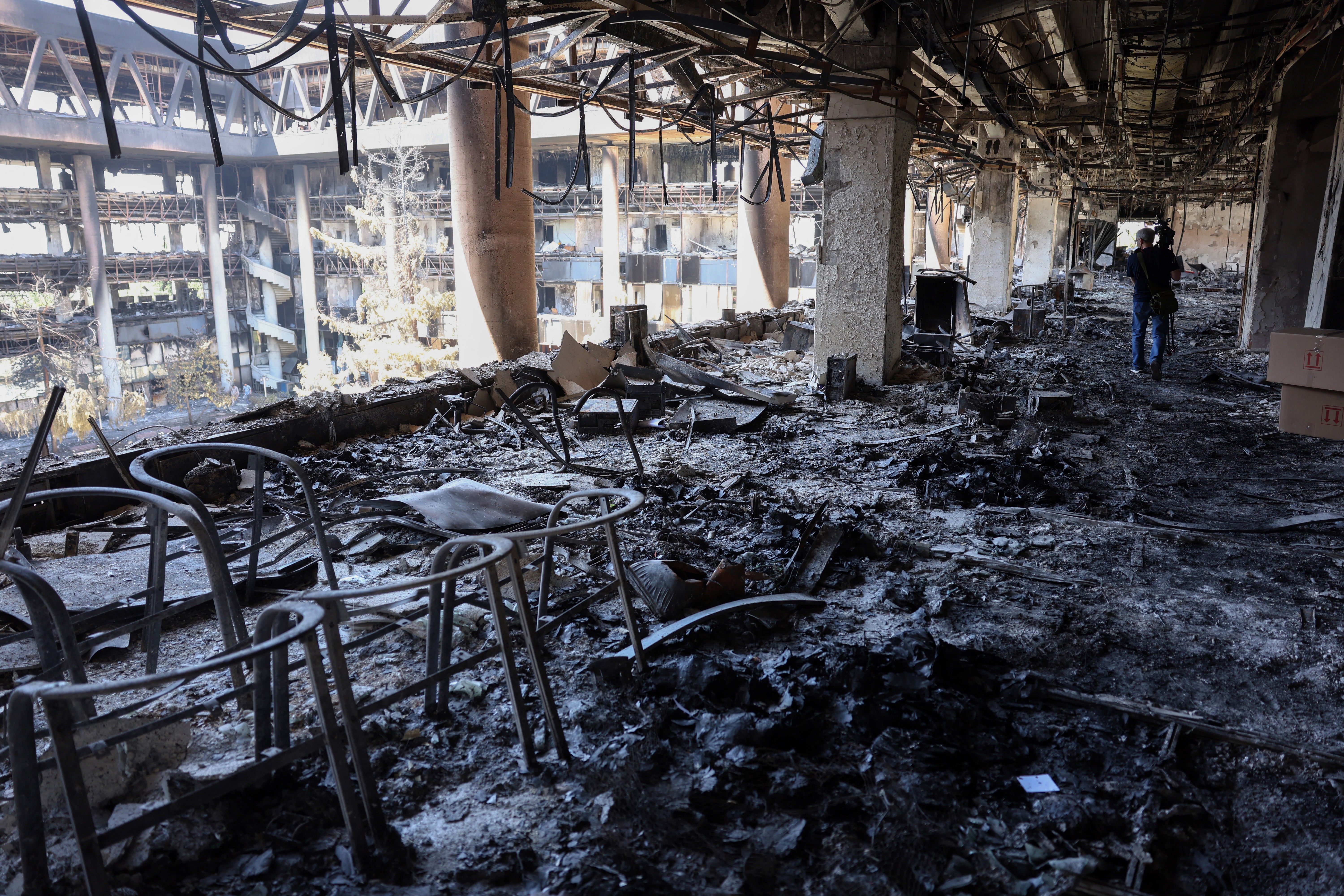 This picture shows the heavily damaged building of the Islamic Republic of Iran Broadcasting (IRIB) after it was hit a few days earlier in an Israeli strike, in Tehran