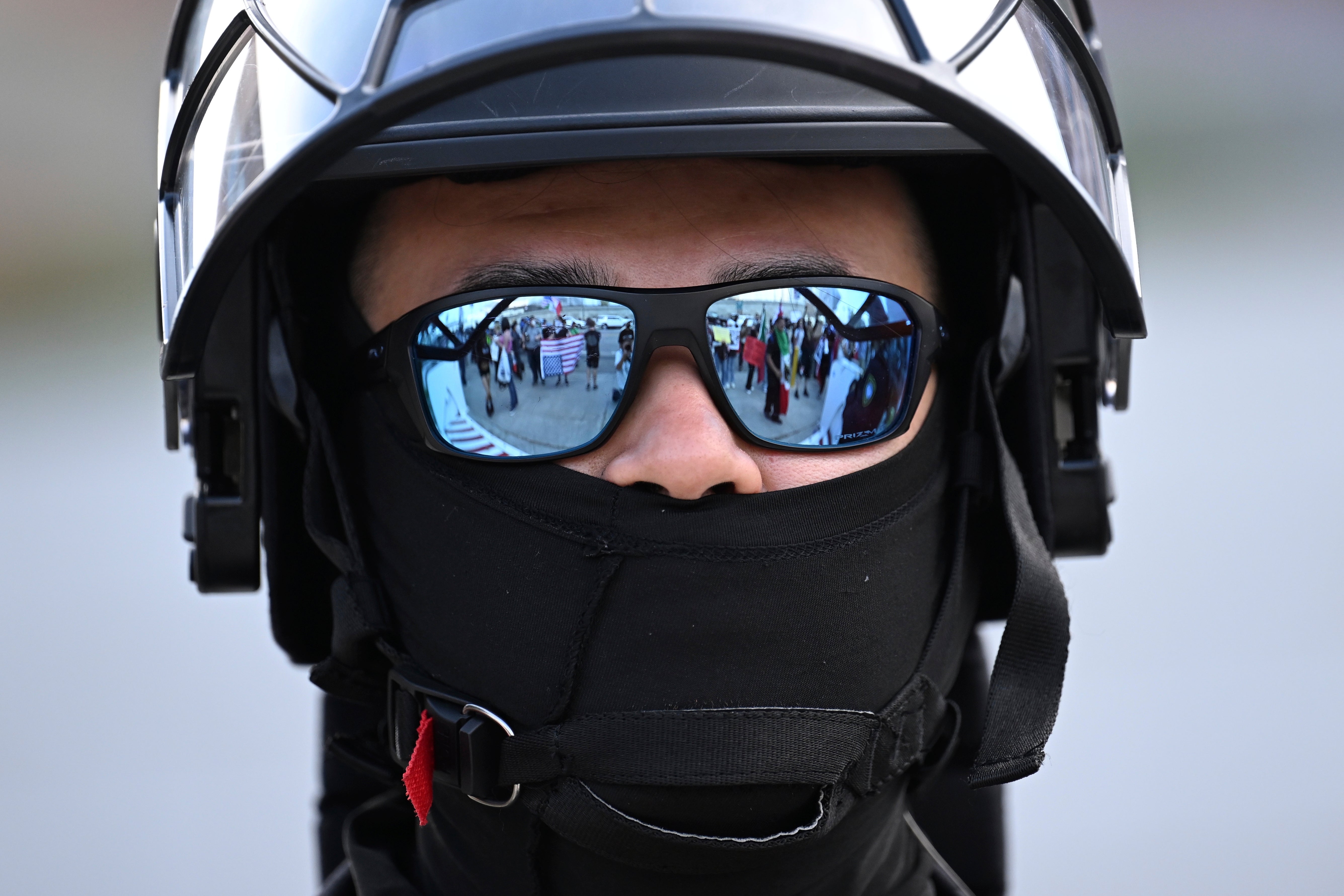 Individuals have impersonated ICE agents in at least three states, and lawmakers in California are pushing to ban law enforcement agents from wearing face masks