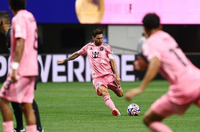 <p>Lionel Messi scores from a free-kick</p>