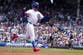 Fan climbs netting at Wrigley Field to retrieve Sal Frelick's bat