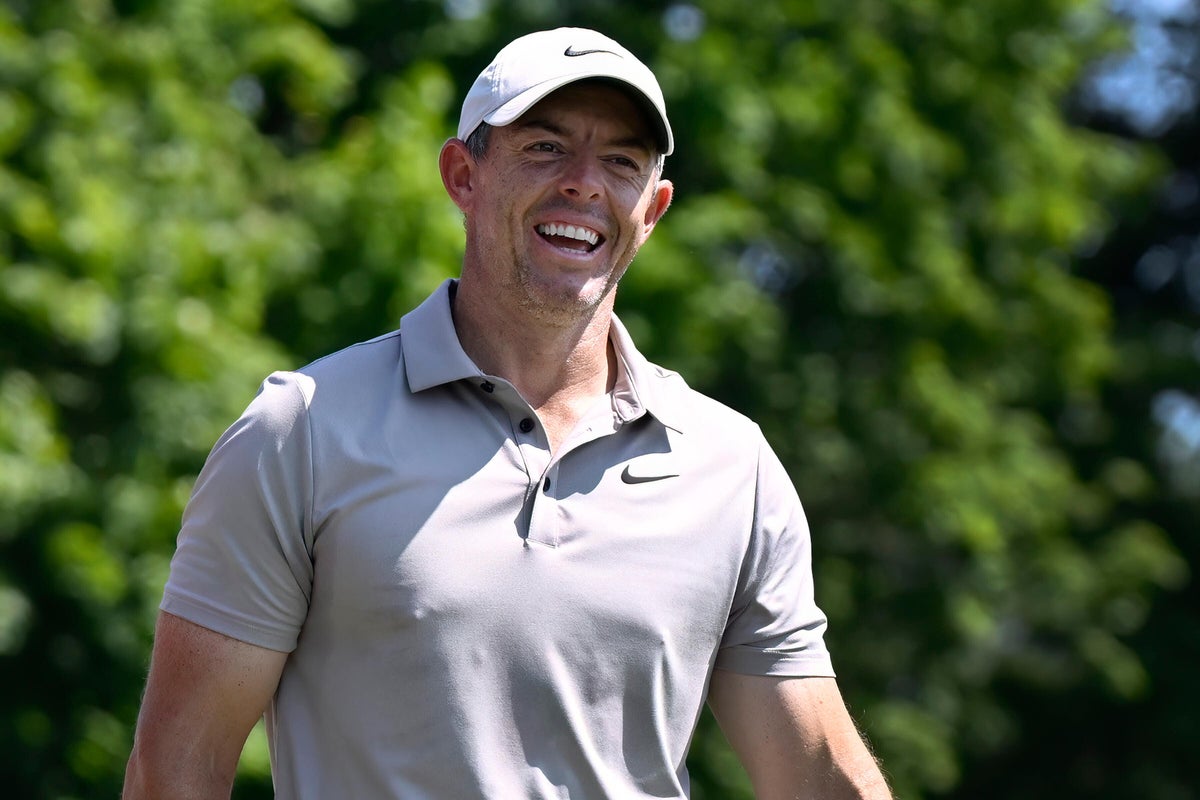 Rory McIlroy trails by two as Scottie Scheffler holds share of lead