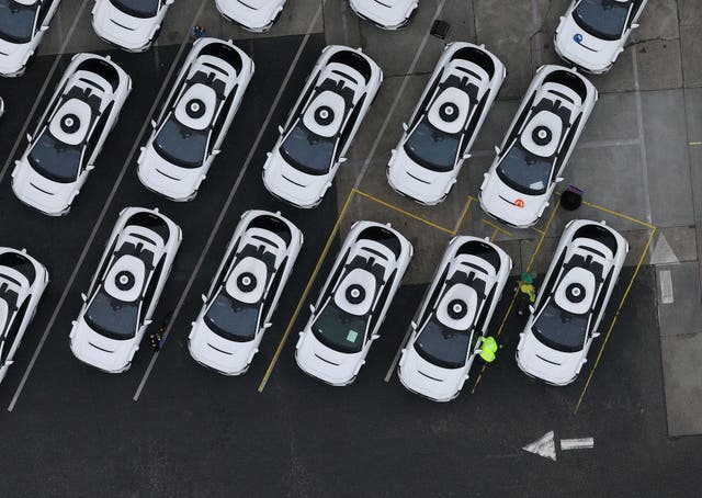 <p>Waymo cars pictured in San Francisco. The company wants to bring its self-driving cars to New York City with "trained specialists" behind the wheel</p>