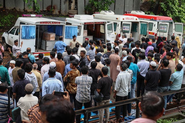 <p>People gather to pay tribute to the mortal remains of Javed Ali Syed, a British national originally from Mumbai, his wife Mariam and their children Amani and Zayn, at his residence before their funeral in Mumbai, India, 18 June 2025</p>
