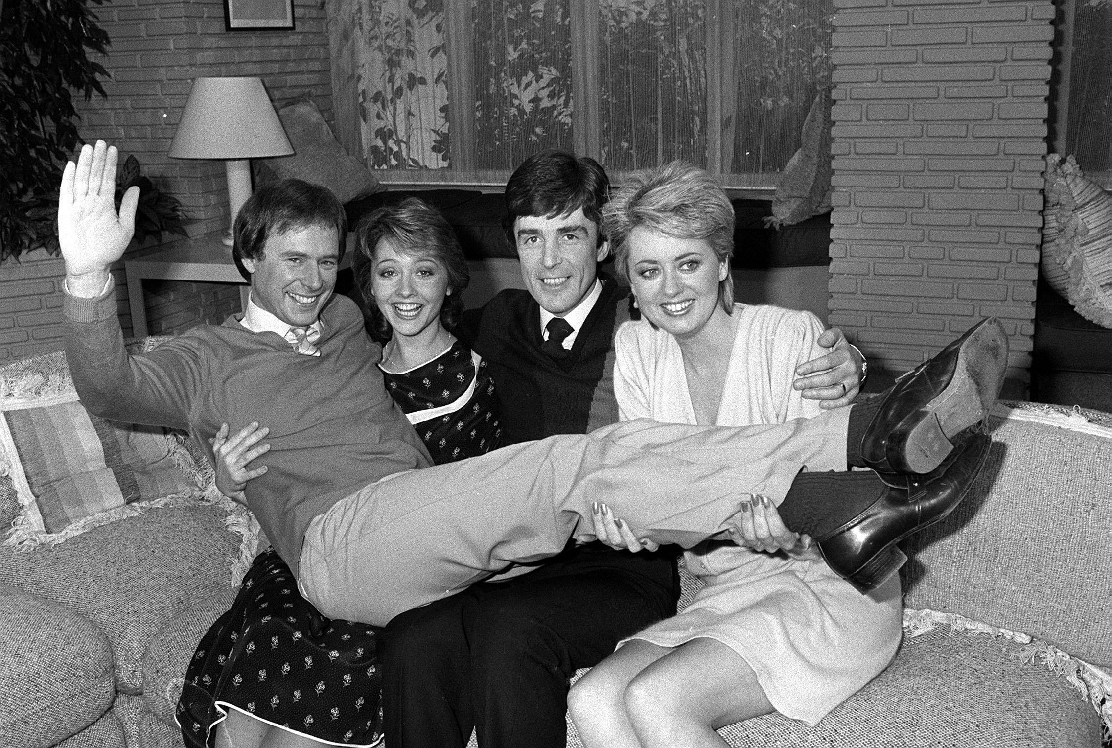 TV-AM presenters (L-R) Nick Owen, Anne Diamond, John Stapleton and Wincey Willis, in the breakfast TV show's studio in London, where they celebrated the programme's first anniversary.
