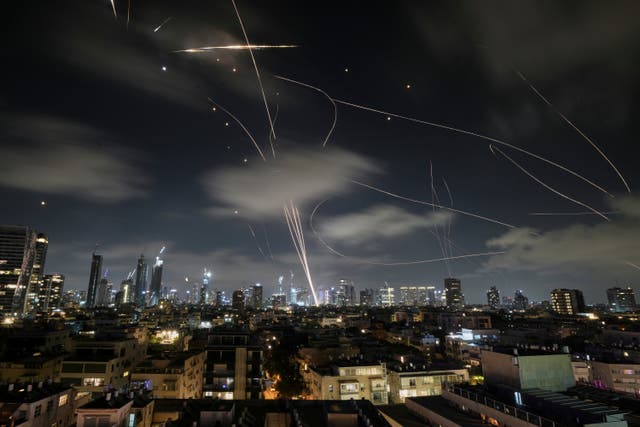 <p>The Israeli Iron Dome air defense system fires to intercept missiles during an Iranian attack over Tel Aviv, Israel.</p>