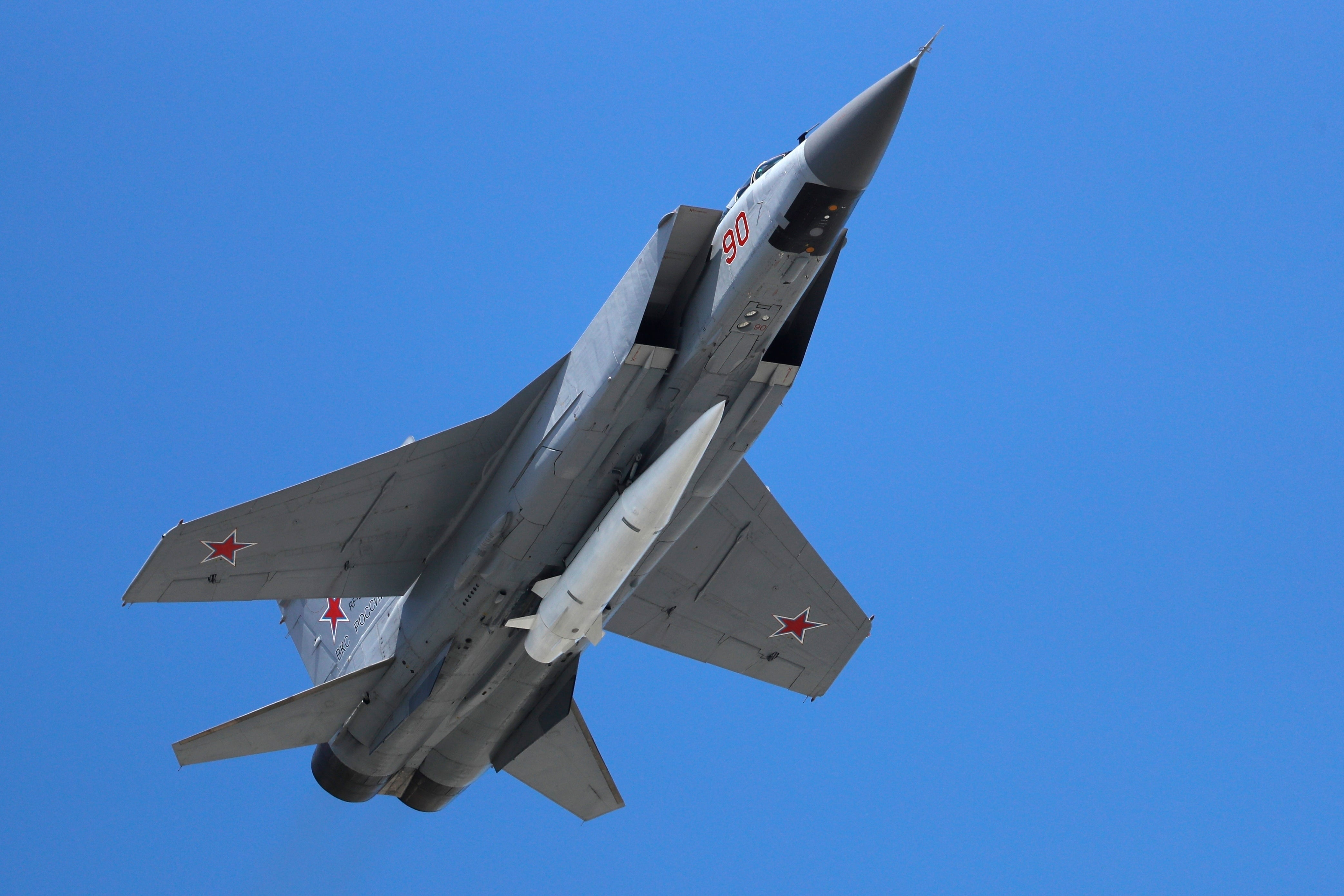 A Russian Air Force MiG-31K jet carries a high-precision hypersonic aero-ballistic missile Kh-47M2 Kinzhal