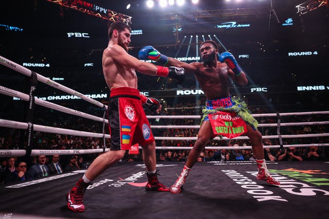 <p>Jaron Ennis in action against Karen Chukhadzhian in 2023</p>