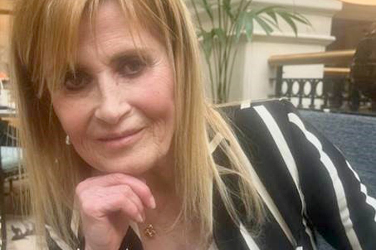 Woman charged with murder of film director in missing Rolex case