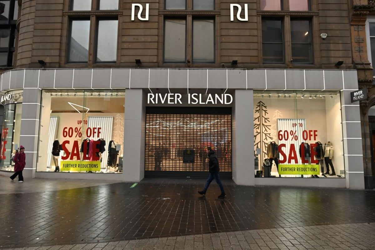 Business news live: FTSE 100 falls and River Island announce 33 shop closures
