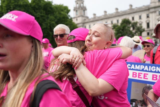 <p>Right-to-die campaigners celebrate a historic vote outside parliament</p>