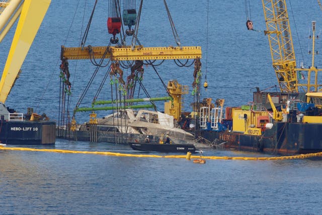 <p>Floating crane ships HEBO LIFT 10 and HEBO LIFT 2 recover the "Bayesian" yacht of British tech entrepreneur Mike Lynch, who died when the yacht sank off Porticello, near Palermo, Sicily, Italy, June 20, 2025. REUTERS/Igor Petyx</p>