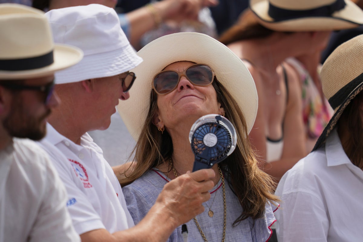 Photos of Western Europeans coping with the year's first heat wave