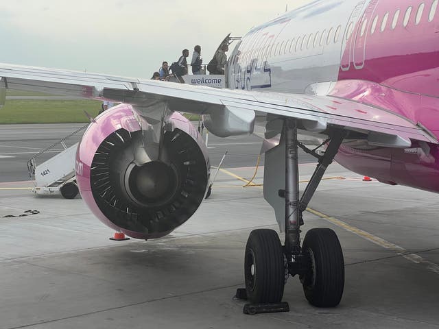 <p>Wizz away? Passengers boarding Wizz Air plane in Warsaw</p>
