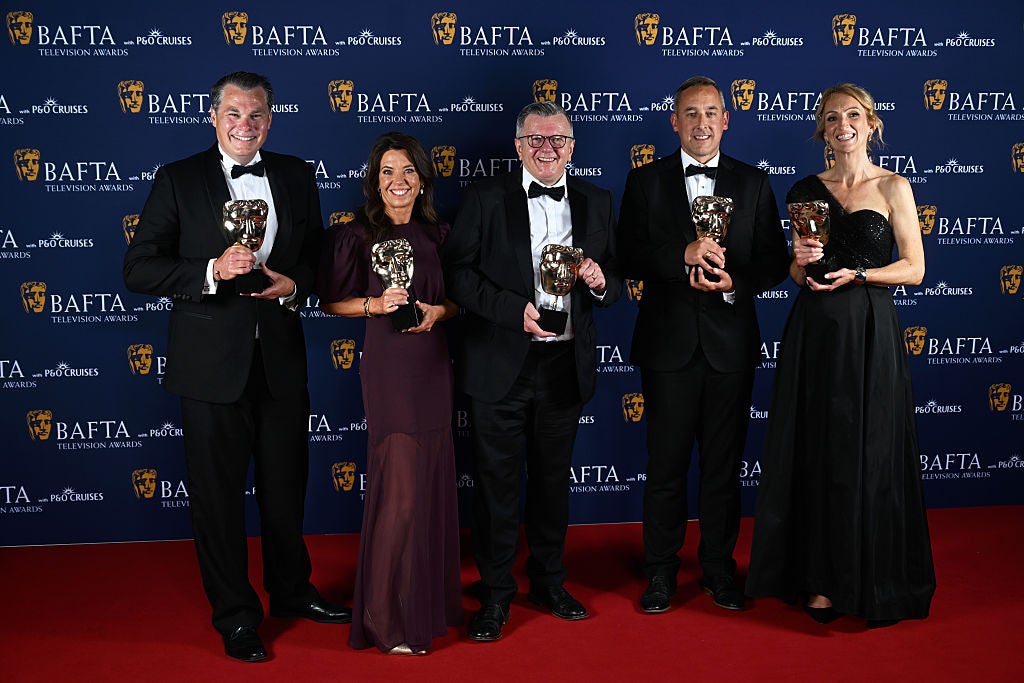 Gareth Knowles, Kelly Crawford, Richard Frediani, Liam Blyth and Caroline Turner pose with the News Coverage Award for 'BBC Breakfast: Post Office Special'
