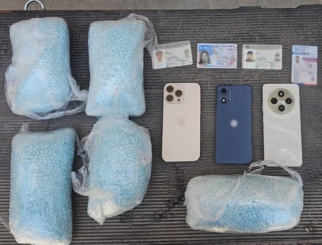 <p>Mexican police discovered 110,000 fentanyl pills, four ID cards and three phones inside a car traveling through Ciudad Juárez. Three people, including a U.S. citizen, were arrested in connection with the pills</p>