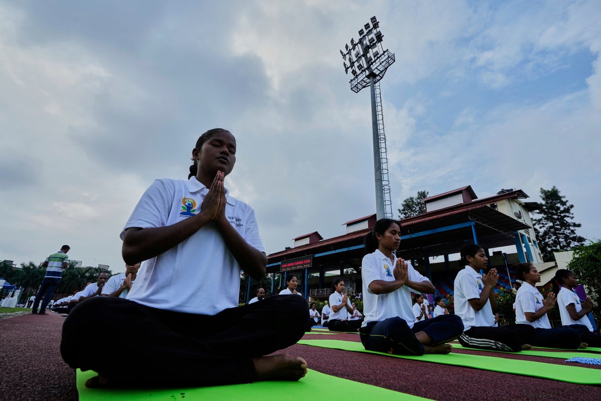 In pictures: Modi leads record attempt as India marks International Day of Yoga