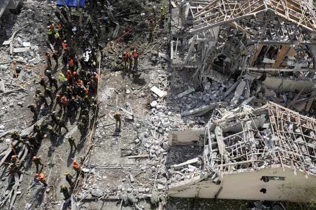 <p>The site of a direct missile strike launched from Iran in Tel Aviv on Sunday </p>