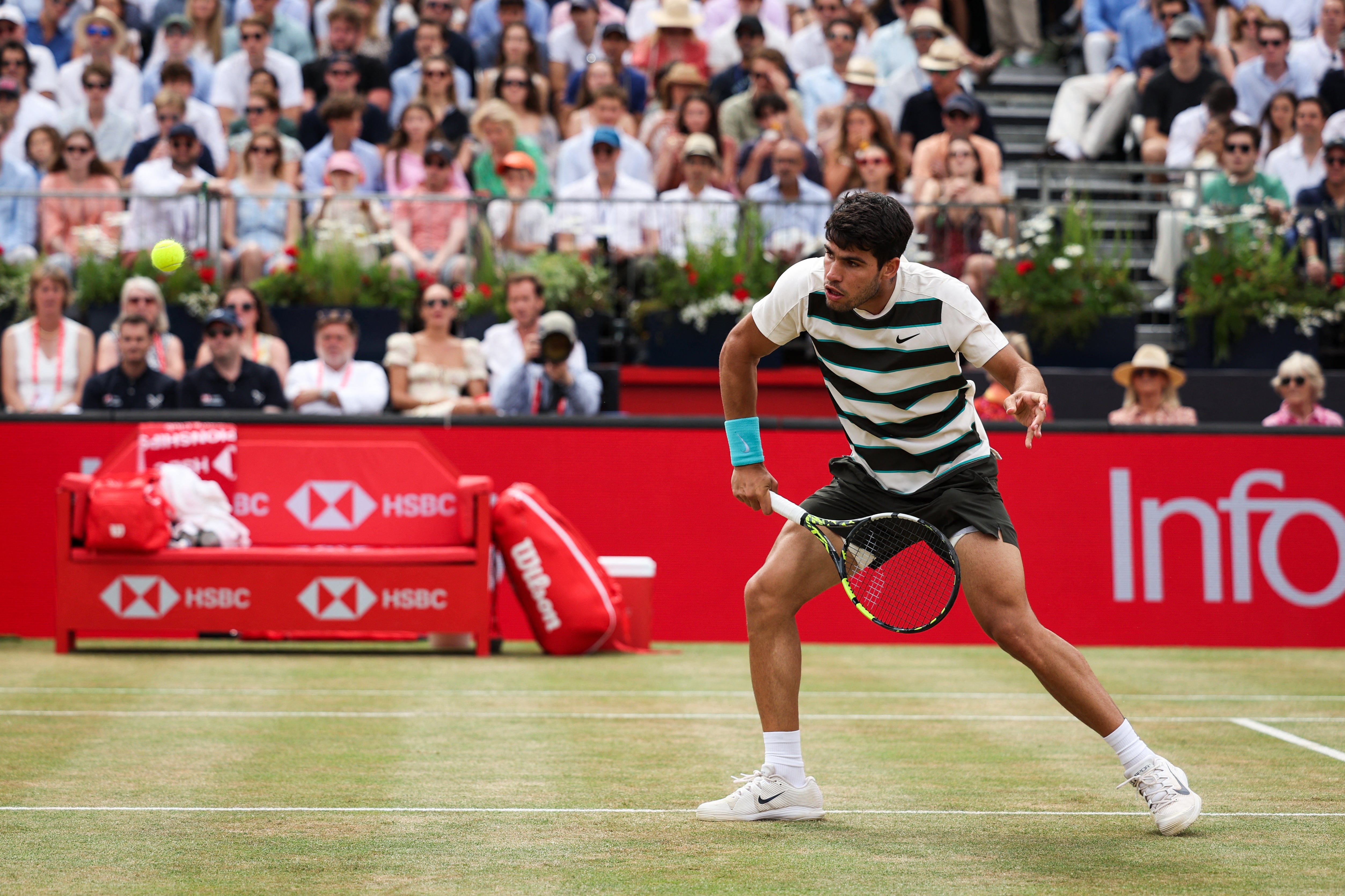 Carlos Alcaraz plays a drop shot during the second set