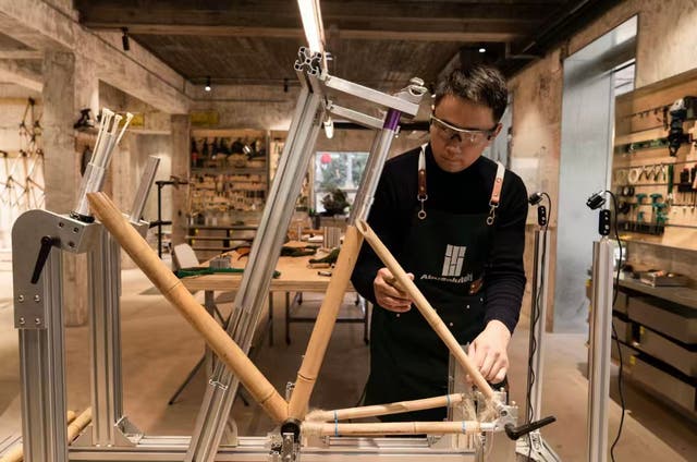 <p>Ren Yao handcrafts bamboo bicycles </p>