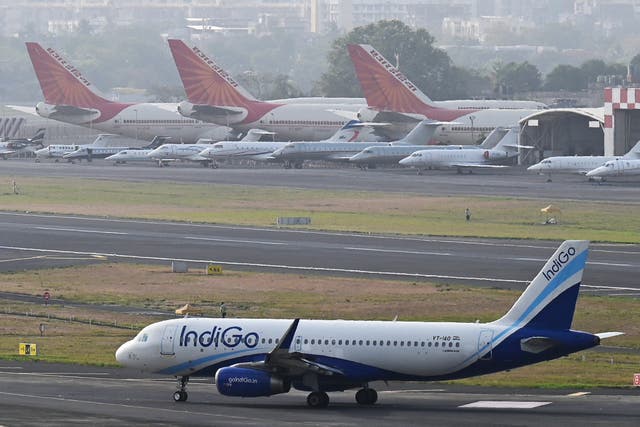 <p>An Indigo airlines aircraft taxies in the apron at the Mumbai International airport in Mumbai on June 20, 2023</p>