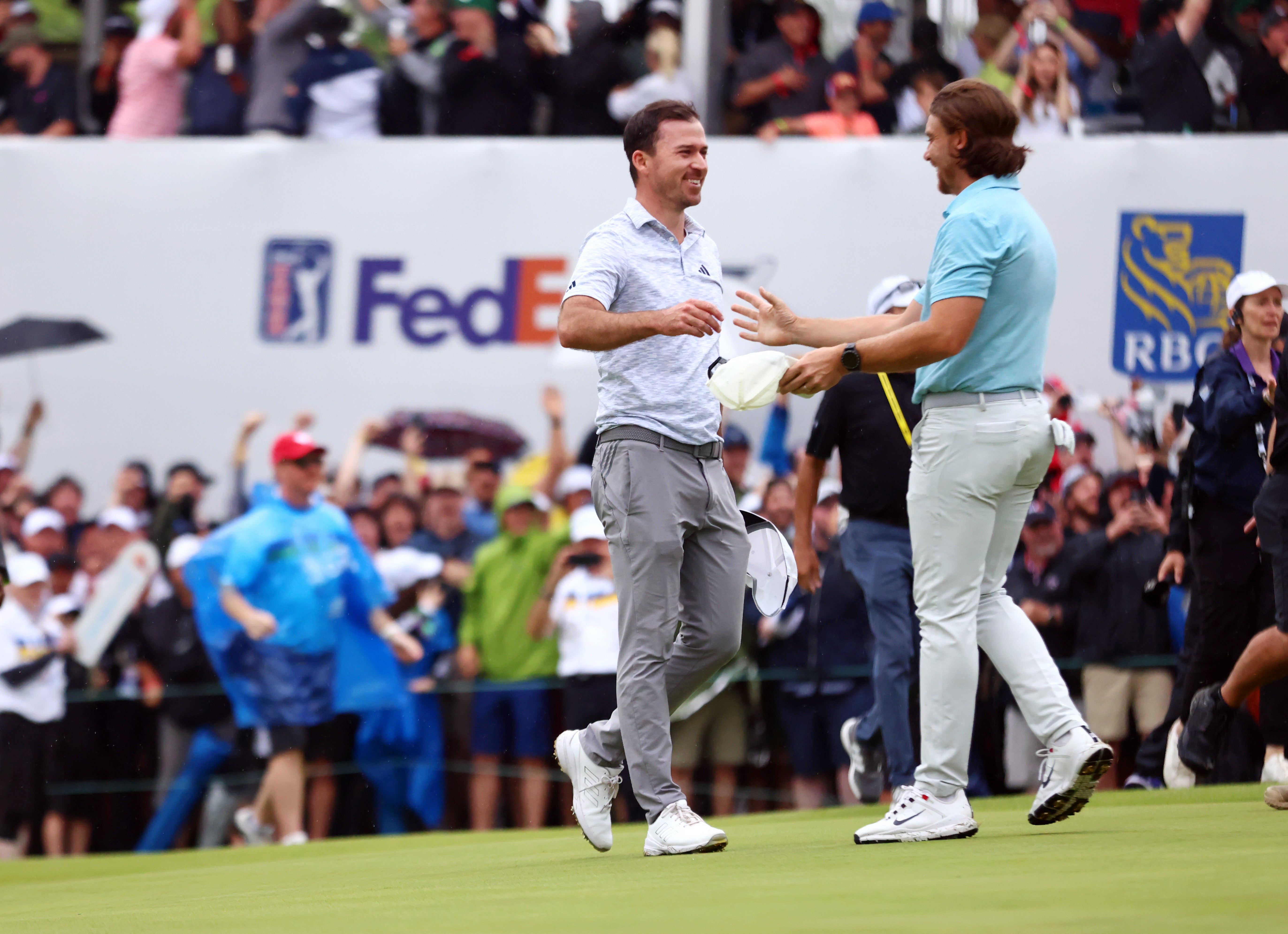 Fleetwood congratulates Nick Taylor on his Canadian Open win in 2023