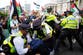 Palestine Action protesters clash with police as government confirms ban on group under anti-terror laws